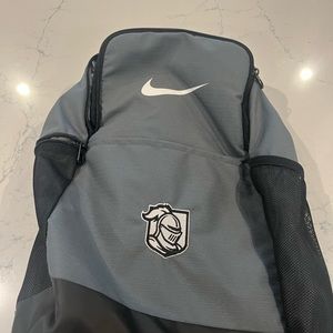 Nike grey backpack. With Belmont Abbey College backpack